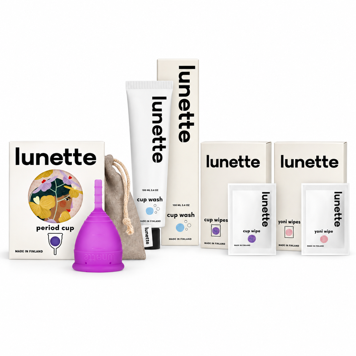 Menstrual cup cleaning bundle with purple cup, cup wash, wipes, and storage bag